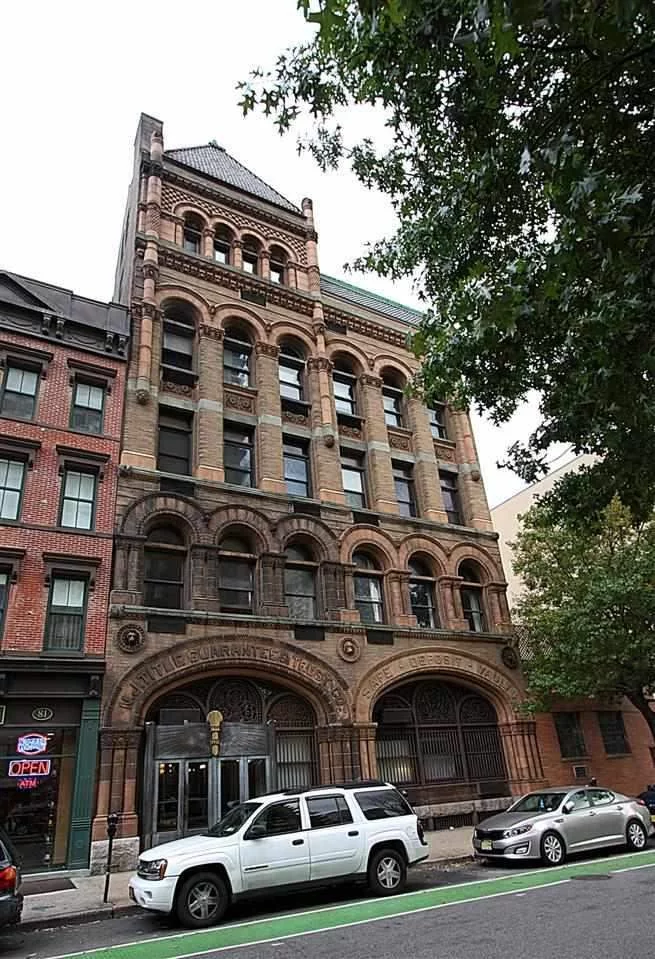 Paulus Hook Loft! Rare to market, architect's 1000sf duplex loft, newly renovated in prestigious Bank Bldg. Historic details are preserved & highlghted w/ modern design. Space is unique w/ 17' ceiling in living area. 2 BR's, 1.5 BA, walk-in closet, built-ins & lots of storage. European bathroom fixtures, Jacuzzi bathtub, Italian glass mosaic tile, original marble & polished concrete & wood floors. Glass kitchen cabinets, granite countertops, SS appls. Euro combo W/D in unit. 1 deeded prkg space incl