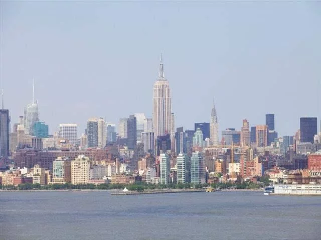 Mandalay on the Hudson. This 2 bedroom 2 bath condo has sweeping NYC views to the north & east flooding the home with natural sunlight. This waterfront property features, a Gourmet kitchen w/SS appliances, granite counters, tile back splash, hardwood floors, w/d in-unit, luxurious baths, deeded parking and private terrace complete the the picture. Located in a full service building with 24hr concierge, fitness center and a spectacular outdoor pool.