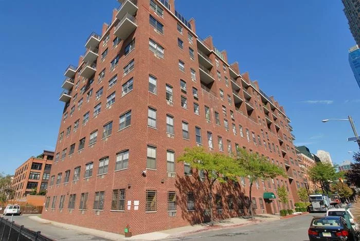 Gracious Urban Living: Luxury 2BR/2BA condo in the Heart of Historic Paulus Hook at edge of Morris Canal. 1 block from Hudson River. Statue of Liberty, Verrazano + River views from unit & private balcony. Unit features many renovations, all new kitchen, large windows, grand balcony, HWF & more. Bldg features atrium lobby, glass elevators, pool, 24 hr doorman, valet parking + more. Close to PATH, Ferry, LRT and 30+ restaurants. Heat,  Hot Water & mandatory valet parking included in maintenance of $1214.58
