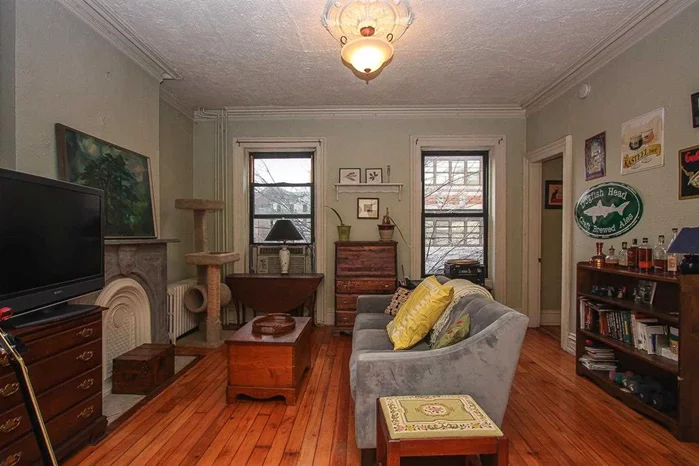 Lovely 1BR/1BTH w/lots of historic charm in Downtown, Jersey City! Features original marble (non-working) fireplace, large renovated kitchen from this year, all original built in cabinets and pocket doors, a huge yard plus shared patio with 3 other condo owners including a gas grill/outdoor furniture. Huge storage unit in basement. Close transportation to NY, restaurants, shopping and so much more!