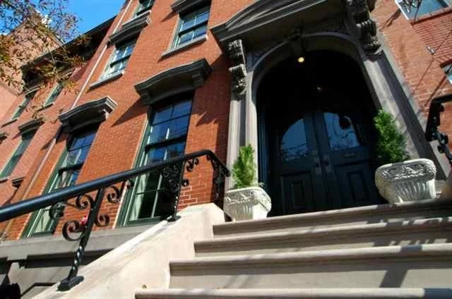 Stunning 3BR/3BTH in charming brick rowhouse in NON FLOOD zone of Paulus Hook! This beautiful home feat: high end finishes thru-out, original moldings & doors, exp. beams, recessed lighting, brazilian cherry H/W flrs, true Chef's Kitch. w/prof. grade SS appliances, 3 huge built in cabinets, surround sound sys. in great rm, original marble flrs & FP in bths, exp. brick & customized closets thru-out. Upper level feat: master suite, w/balcony, 2 WIC, 9 skylights, laundry rm, lots of storage & much more.