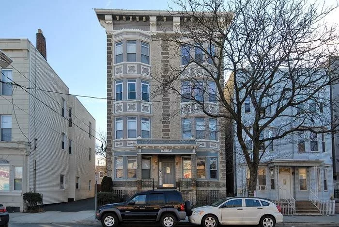 Airy, ample gem in the heart of the Heights, this brownstone condo has natural sunlight pouring thru its windows with NYC and Statue of Liberty views. Renovated 2BR/2BA, central air, hardwood floors, wood trim throughout, 2 full baths, exposed brick, ss appliances, spacious bedrooms on each end, custom made closets, NJ Transit at door to Midtown/Jnl Sq., close to Light Rail & Path. FIOS ready, shared outdoor space, laundry rm, bike rack and storage, border of Hoboken, close to Riverview Fisk Park.