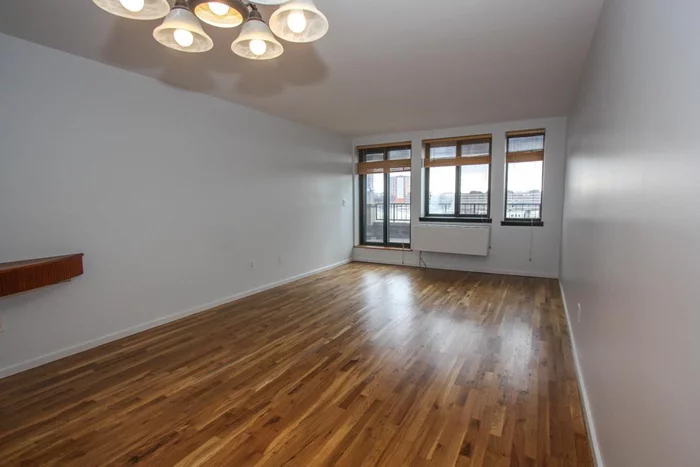 Sunny northern exposure 1BR, 1 BA luxury condo located only 1 block from Jersey City's beautiful Hamilton Park. Feats: Galley kitchen complete w/ SS appls, recently updated C/A/C & heat, hdwd flrs, open dining lvg rm, spacious BR w/ walk-in closet plus 3 add'l large closets, laundry rm, a huge open air pvt terrace w/ NYC skyline views. Garage & outdoor prkg. A few blocks to transportation options incl. the Newport PATH station, 7 minutes to NYC, NY Waterway ferry, Hudson-Bergen Light rail & Holland Tunnel.