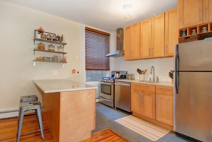 Fantastic 2Br. Spacious kitchen features granite counters, ss appliances and 42 custom cabinets. Don't let size of home fool you.. plenty of room for dining table and separate living area. Other features include HW floors, storage in basement W/D room, custom window treatments and custom closet organizer. Bus to path or NYC 1 block away.