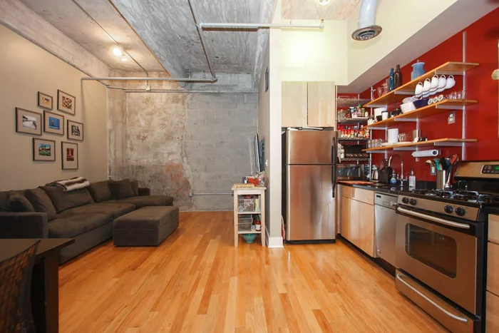 Renovated 1BR/1BA loft in converted warehouse building! Gorgeous unit located in the power house district of downtown Jersey City features large open layout, soaring 12ft ceilings, exposed brick, granite countertops, SS appliances, washer/dryer in unit, hardwood floors and central a/c. Close to PATH, Light Rail & NY ferry. Parking available for rent in area. Building also features common roof deck with view!