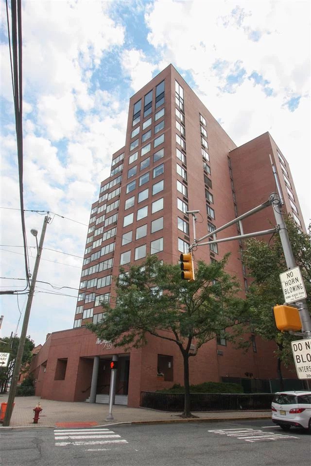 Luxurious Skyline building, 2Br 1.5Ba corner unit located in Hoboken! H/W floors throughout, breakfast bar, 1car parking included. Br's are 12x14 and 12x16. Features include 24hr Doorman, valet parking, shuttle to the PATH, garage, laundry room on each floor, gym, and large common roof deck perfect for entertaining guests! Near all local parks, schools, and restaurants!