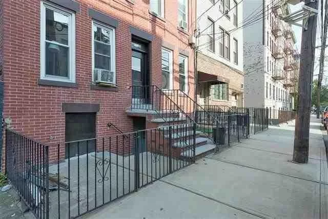 Don't miss this charming 980 sqft 2 bed/1 bath condo in midtown Hoboken! This fabulous home is loaded with character and features:a modern kitchen with stainless steel appliances. Spacious living and dining room with exposed brick and wainscotting. Hardwood floors throughout. Separate mudroom with washer/dryer and storage. Best of all this unit features a large private deck- perfect for bbq's and entertaining! Add'l storage in the basement. Close to all transportation, great shops and restaurants!