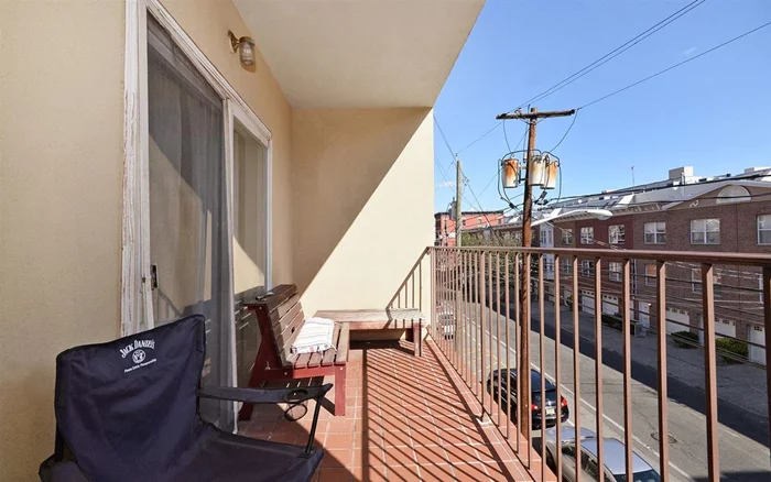 Incredible value 2 bedroom 2 bath with balcony and parking in elevator building. Open style kitchen overlooks the large living and dining areas. Other features include hardwood floors and stainless steel appliances. Hurry won't last