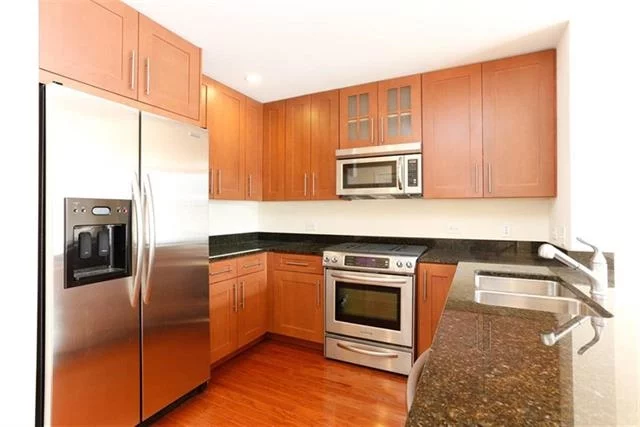 Location, Luxury, Maxwell Place! Exquisite 895 SqFt. South facing 1 Bedroom with NYC and Hudson River Views. Chef's kitchen features granite counters, custom cabinets and stainless steel appliances. Master bedroom easily fits king size bed and has 2 closets. Community features 24 hour concierge, 2 pools, 2 gyms, community room with direct NYC views and theater, and landscaped roof top gardens with BBQ's TV and fireplace. Commuters dream! Ferry located around the corner of or take private shuttle tot he PATH. Deeded parking included. Attn investors: Tenant in place thru May 2017.