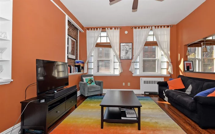 Bright and immaculate renovated 1BR home in prime uptown location! Uniit features exposed brick, tumbled glass doorway,  updated kitchen with granite countertops & SS appliances and gleaming hardwood floors throughout. Common washer/dryer downstairs. Move right into your new home today! Shops, restaurants & Bus to NYC at your doorstep.