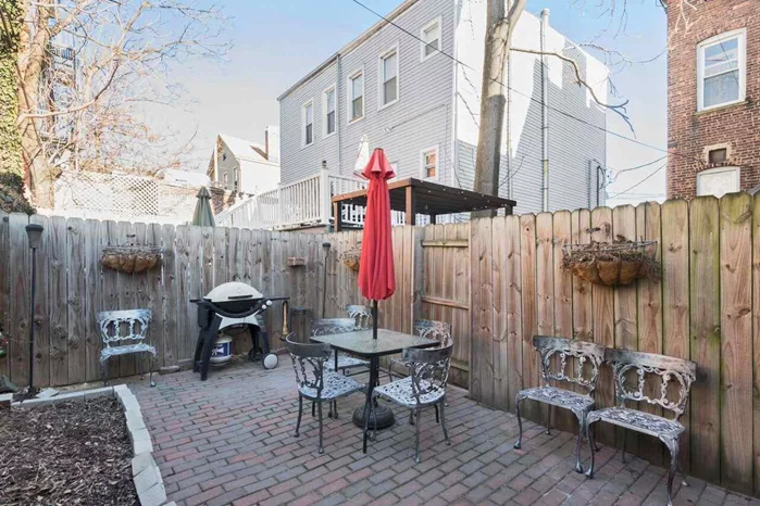 Recently renovated, this oversized (1371 sq ft) 2 bed 2 bath condo with its own private backyard is in a great JC Heights location! Just half block to Central Ave. and one block to Congress Street, close to both Riverview Park and Washington Park. The kitchen features granite countertops, stainless steel appliances including dishwasher and built in microwave, gas stove and side by side refrigerator. Hardwood floors throughout. Washer/dryer in unit, plus additional storage in the vestibule closet. The separate living and dining rooms plus the private backyard make this home great for entertaining!