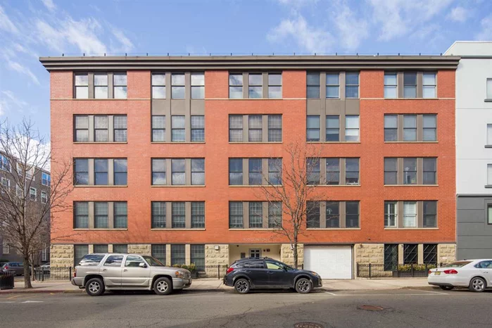 Light pours through 9 windows into this lovely condo at The Crossings, a preferred uptown steel and concrete elevator building with garage parking. Sun filled living area with gleaming hardwood floors open to breakfast bar of chef's kitchen outfitted with cherry cabinets, stainless steel appliances and black granite counters. Master bedroom suite complete with two closets and marble bath. Close to Columbus Park, schools, shopping, restaurants and transportation to NYC. Central heat/air, in-home washer/dryer and garage parking with extra storage make this the perfect place to call home.