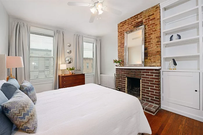 Stunning, renovated 1 bedroom 1 bath condo in downtown Hoboken with huge windows facing both east & west, this elegant condo features exposed brick, hardwood floors & custom built -ins. Brand new kitchen with ample cabinet space, wainscoting and a large dining area. Style, function and a Path perfect location.