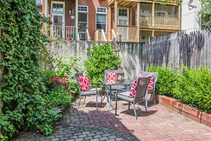 Beautiful, 2br + office, 1 bath condo w/ amazing huge private landscaped backyard. Newly updated home features Gas fireplace, exposed brick walls, hardwood floors, great storage space w/ custom closets, central A/C & full size washer & dryer. Newly updated kitchen w/ SS appliances, granite counters, dishwasher & breakfast bar. Spacious master br w/ 2 skylights, 2 custom closets. 2nd bedroom also sizable & bright w/ French doors. Plus bonus office space. Bathroom has 2 sinks & great storage. Easy commute to NYC via PATH or bus. Great Opportunity to buy for primary residence or an investment.
