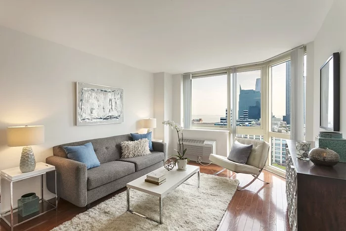 This south-facing, high floor 1 bed, 1 bath home is meticulously maintained and offers sweeping views of Lower Manhattan, the NY Harbor & New Jersey. Being on the 22nd floor gives you open sight lines through floor-to-ceiling double bay windows, which also let in tons of natural light all day long. The unit itself is a perfectly laid out 600 sq. ft. with hardwood floors running throughout and a clean white kitchen with granite countertops. In-unit washer/dryer, tons of closet space, newer heating/ac units and a deeded parking spot complete this picture-perfect home. Enjoy the resort-like amenities at The Mandalay, including fitness center, heated pool, BBQ area, private park, children's playground and more. Minutes walk to light rail, Exchange Place & Newport PATH, and the Harborside Ferry offering only a few minutes commute to lower and midtown Manhattan. Plus you'll be only 3 blocks away from the upcoming Whole Foods!