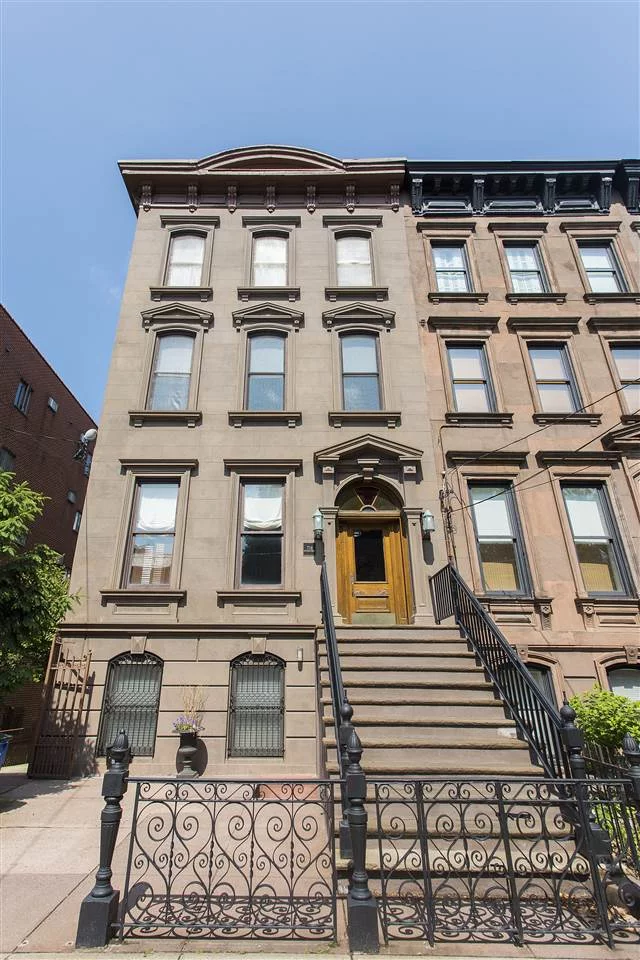 Beautifully renovated one bedroom condo on fabulous Hudson Street location, for easy walk to PATH, Washington Street, Parks Hoboken Terminal and NYC Waterfront. This corner home is replete with high ceilings, exposed brick, and open living space with hardwood floors throughout, and fantastic closet storage within the unit. Chef's kitchen which includes granite countertops, and stainless steel appliances as well as built-in Wall A/C and washer/dryer. Several oversized windows facing east and south provides tons of sunlight throughout the day. This is a special property within a historic brownstone circa late 1800's and renovated for today's modern living.