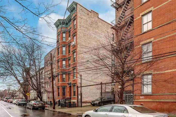 Location!! Gorgeous, historically sited building,  located just steps to Path trains, lively Newark Ave and tranquil Hamilton Park. Hardwood floors, high ceilings, fireplace mantle, pocket doors, built-in shutters. . 1br + den features 680sq ft : washer/dryer room & private storage in basement. Kitchen needs some updating. Priced to cell!!