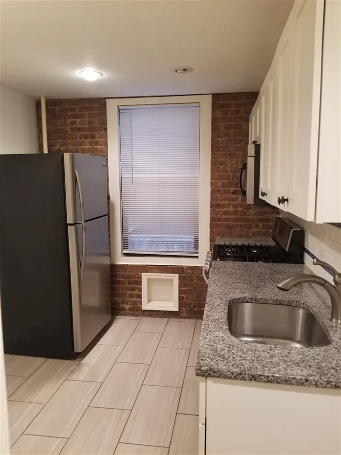 Why rent when you can own this beautiful 1st floor well appointed unit renovated 4 years ago with sophisticated finishes and is in excellent condition. This condo is also a an excellent opportunity to invest and add to your portfolio as the Bayonne Rental Market is strong and offers a good solid Cap Rate! The home is spacious and offers a nice flow. Stainless steel appliances in the kitchen with ample cabinet space. All rooms are nice size! The Heat and Hot water are included in the HOA fee as is overall general maintenance of building. The home is situated close to parks and Bus routes to downtown Jersey City and Manhattan which makes for a commuters delight. There is laundry room in building and storage is available. This is a nice comfortable place to call your new home! Video tour is available!