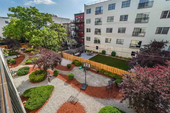 Find your sanctuary in your own oversized, meticulously landscaped backyard complete with a basketball hoop, gas grill, beautiful dining table and chairs and seating all around to easily social distance in style at the highly sought after Alexander Condos conveniently located in downtown Hoboken. Residence 3A has a perfect split layout with open floor plan, high ceilings, chef's kitchen perfect for entertaining, with a pantry closet and new stainless steel appliances including a Bosch dishwasher. This stunningly maintained home has been upgraded to include a spa-like master bath with walk in glass enclosed shower and stylish second bath, custom closets by Vincent, recessed lighting throughout and gleaming natural hardwood floors. Find working from home quite peaceful in this nearly 1200 sqft quiet oasis. Enjoy a fully open private resident's gym, elevator, and large parking space for all your storage needs. The Alexander is just a short distance from the Lightrail to the PATH, a private kids park across the street, the all new Southwest Park, shopping down First St., and great restaurants like Hot House, Northern Soul, Choc o Pain, and Antique!