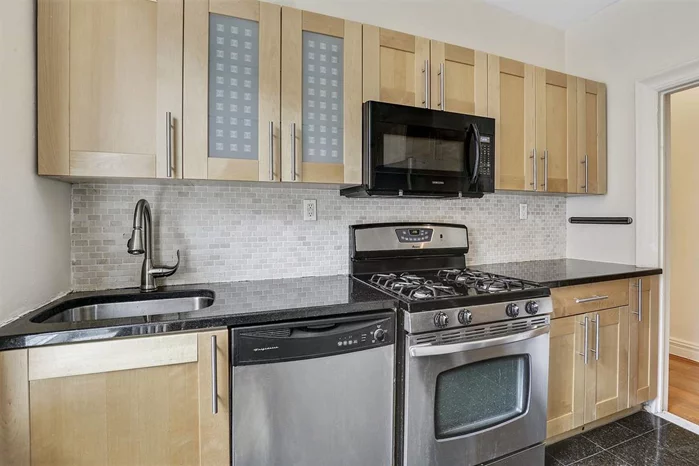 Welcome to 57 Corbin Avenue. This renovated 1 bedroom features hardwood floors throughout, updated kitchen and bath. Enjoy common area , laundry lounge, new lobby entrance, and usable back yard. Prime Journal Square location with close walking distance to the PATH, shopping and restaurants. Call for a virtual or in-person tour today.