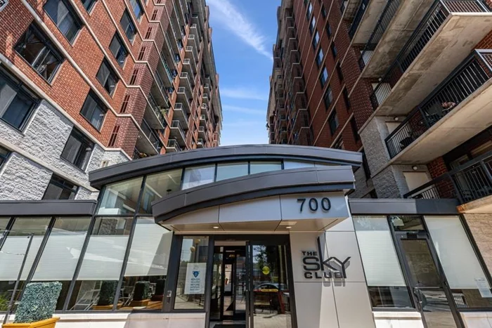 Beautifully Maintained Studio in the SKY CLUB! This Open & Spacious apt. Features Brazilian Cherry wood floors, SS Whirlpool Appliances, Sleek Granite Counter Top & Breakfast bar, W/D & lots of Closet Space! Amenities included 24 Hr Doorman, Free Shuttle to PATH. State of the Art Gym and Pool memberships available.