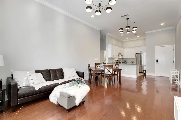 By APPT only  Masks are required for all visitors~  Do not miss this generously laid out and fabulously appointed Paulus Hook 2br 2ba home! This southward-facing, spacious 1300+ square foot unit is bright and airy with 12-foot ceilings. Generously sized bedrooms are tucked away down the hall for privacy. The open living room and dining room are perfect for hosting family dinners or guests. The kitchen is newly updated with stainless steel appliances, marble backsplash, quartz countertop, and a breakfast bar. Spa-like bathrooms, gleaming hardwood floors, in-unit full-sized washer/dryer, and abundant closets make this home complete. This Smart home is enabled with camera, thermostat, door lock, motion and water leak detectionall controllable or viewable from phone  making life easy. One garage parking with storage space is included. Enjoy the common courtyard with green space and outdoor BBQ dining area. Ideally located in desirable Paulus Hook, in close proximity to river boardwalk, parks, restaurants, schools, Grove and Exchange Place PATH stations, and Ferry. PS 16 is 2 blocks away. Ferry is 3 blocks away. PATH stations are a short 10 minute walk away.