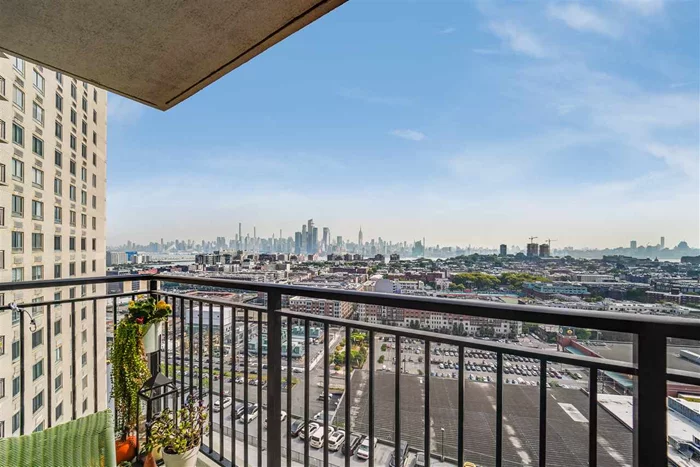 Come live at The Doric with incomparable panoramic NYC/Hudson River views! This renovated 2 bed/ 2 bath unit features new engineered hardwood floors throughout, stainless steel appliances, granite countertops, crown moulding,  custom floor to ceiling wood and glass closet doors, custom cloth shades, new windows, updated tile bathrooms, spa tub and walk-in shower.Don't miss out on the opportunity to live in this incredible full service building with doorman, package room, pool, gym, community room, daycare, laundry, deli, dry cleaner and is within walking distance to Hoboken! On-site parking available for an additional fee. Maintenance fee includes taxes and utilities. Make yourself at home!