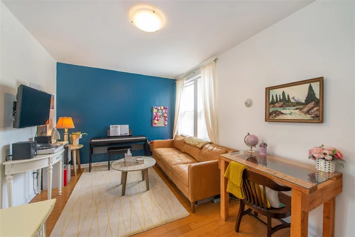 10 min stroll to the Path train to NYC! Looking to get out of Manhattan? This sun - drenched, renovated condo in a well-maintained building could be your answer. This unit has a galley kitchen with a stylish back splash, stainless steel dish washer, sink, faucet, all wood cabinets, oven range, and marble countertops & flooring. The renovated bathroom has marble flooring, tiles & updated vanity. This unit offers bamboo flooring, a large living room, bedroom and lots of closets. The building is cable ready, with a laundry room on-site and outside patio space for all residents. Centrally located to restaurants, fitness centers, & shopping.