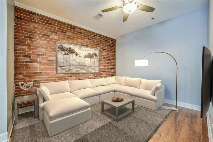 Excellent 2 bedroom. Floors were just installed. Kitchen features custom cabinets and stainless steel appliances. Home has central air and a free washer dryer in the hallway one floor above. located close to 8th street light rail stop making for an easy commute. Low maintenance fees.