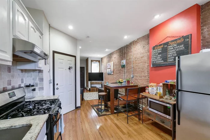Located in the desirable Riverview Arts district of Jersey City Heights. Charming one bedroom with office/den features high ceilings, exposed brick throughout, renovated kitchen with stainless steel appliances, recessed lighting, private storage,  FREE laundry in the basement and a common backyard. Great neighborhood just minutes to Light Rail, NYC bus & Riverview park with it's seasonal farmers market & arts/music events. Low taxes & maintenance is a plus! Don't miss this one!