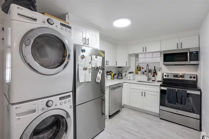 Beautiful first floor 2 bedroom apartment in West NY! This apartment features two nice size bedrooms, hardwood floors, small communal backyard, in unit washer/dryer and ample closet space. Close to all public transportation, parks and only two blocks from JFK blvd!!!
