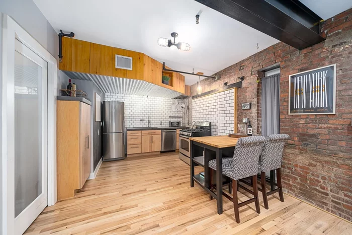 Industrial chic large studio with separate entrance & spacious private use patio in desired downtown Jersey City! This unique one-of-a-kind loft-like home features an open floor kitchen & living plan with charming original details of exposed brick & steel beams, custom built-ins throughout, dedicated office nook, secluded bedroom area & ample storage space. The kitchen comes equipped with stainless steel appliances including dishwasher, concrete counters, modern subway tile & cabinetry. Just off the kitchen is a large storage room, which can easily accommodate an in-unit washer/dryer, although shared laundry is just steps away! The sleeping area is roomy & tucked away and includes custom-tailored shelving & closets  an organizer's dream! The ensuite bathroom features a brand new Delta temperature-controlled shower, spa-like wood accents, subway tile design & more built-in storage. Upgrades include brand new entry & storm doors, new HVAC unit, Google Nest thermostat to control central air/heat energy costs, and newly refinished hardwood floors.  Dixon Mills is a pet-friendly community & full-amenity complex with 24-hour security, concierge with delivery storage room, 5 shared courtyards with BBQ grills and seating, and an 8, 000 sq. ft. multi-use lifestyle center featuring a gym, fitness studio, basketball/volleyball court, locker rooms, sauna, media screening room, resident lounge with pool table and much more! Private parking options available. Located in the heart of downtown, you are steps away from notable neighborhood eateries & shops, beautiful Van Vorst Park with newly renovated dog run, Newark Street pedestrian plaza dining & nightlife, Hamilton Park, River Front & all that this vibrant community has to offer. Commuting is a breeze with the Grove Street PATH (7 Min. Walk) & Light Rail (11 Min. Walk) just a few short blocks away, Citi bike hub outside the building, and quick access to I-78 & Holland Tunnel. This rare find is the ideal starter home and a must-see. Be a part of Jersey City's history & culture and make it yours!