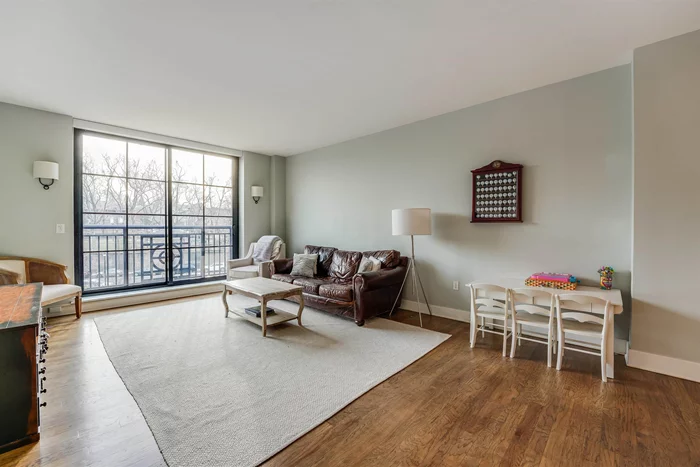 This sought after layout in Maxwell Place features 1 BR + oversized den with ensuite full bath - perfect for second bedroom. Unobstructed south facing views of Elysian Park & Hudson River/NYC provide privacy and abundance of natural light. Features open chef's kitchen with island, granite countertops, S/S Appliances, breakfast bar & spacious living room/dining room. Deeded parking space, 24hr concierge, pool, resident's lounge, shuttle to PATH, 3 blocks to ferry.