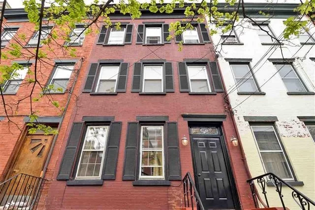 Welcome to this bright 2BR/1BA 744 SqFt. Featuring hardwood floors throughout. Living space features exposed brick, a custom kitchen, and a working fireplace. Custom closets, and a full-size, in-unit washer and dryer add to the features of this truly special home. Located in the center of it all, just steps from Church Square Park, fabulous restaurants, multiple parking garages, and only a few minutes walk to the bus or PATH. Low monthly HOA, only $247.50/month.