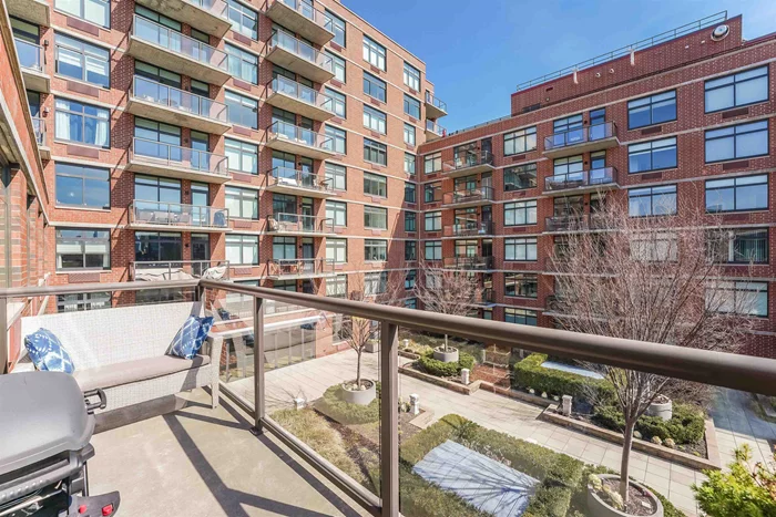 Welcome to 1400 Hudson- one of Hoboken's latest luxury Toll Brother's steel and concrete buildings. This sprawling 2 bedroom/2 bathroom home is conveniently located on the top floor with eastern exposure, and facing the beautifully landscaped courtyard. A true oasis- extra quiet and filled with natural sunlight! The beautiful kitchen has top of the line stainless steel appliances: Thermador Refrigerator and cooktop, Bosch dishwasher and microwave, sleek cabinetry, quartz countertops, plus large breakfast island. Bedrooms are on opposite sides of the home giving each room that extra amount of privacy. Master Bedroom sized to fit a king size bed; master bedroom also has large, custom California Closets. Additional features throughout the home include, but are not limited to: gleaming hardwood floors throughout, custom built-ins in the living room and master bedroom, upgraded lighting, Container Store Elfa closet systems in the other closets throughout the home, PLUS your own private balcony overlooking the serene courtyard. The 1400 Hudson community features top of the line luxury amenities such as 24-hour concierge, state of the art gym, children's playroom, multiple rooftop terraces with BBQ's & firepit and a swimming pool. What else do you need to add on to the perfect home? Centrally located for a commuter's dream. Private Shuttle to Hoboken PATH, NJ Transit bus stops are a block away, and two blocks away from NYC Waterways. One block away from Hoboken Pier, Maxwell Park and Hoboken's finest eateries at your doorstep. Rentable parking in the garage at 15th and Garden