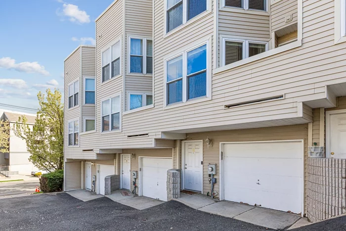 Stunning and newly renovated townhouse is calling for you. This commuter friendly three level unit is located in the Fairmont section of Hackensack. This two bedroom, one and a half bathroom unit features an attached garage with parking for one cars. Open space concept with hardwood floors and oversized windows throughout. Bathrooms features marble flooring, slate tiles, & heated Jacuzzi. Some additional bonuses include a fireplace, skylight, ample closet space, and a private deck. Property is minutes to and from bus stops and major highways.