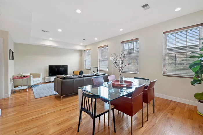 This beautiful, sun-filled 2 bedroom, 2 bathroom top floor condo is located in a great Downtown Jersey City location - just a short distance from the Grove St PATH station and with a Citi Bike station around the corner, great for commuters who can also enjoy the close proximity to some of the best restaurants and shopping that Jersey City has to offer. Great layout, with the two bedrooms separated from the spacious living room with four windows bringing in lots of natural light. Featuring hardwood floors throughout, central a/c, Nest thermostat, smart door lock/doorbell, stainless steel appliances including a quiet dishwasher with three trays, washer/dryer, and abundant closet space. Additional 200 sq ft of storage in the basement. Nice city skyline view. Ask to see the virtual tour!