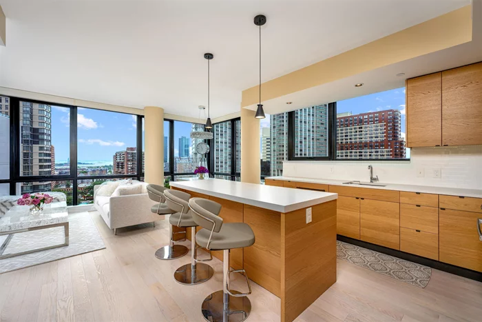When they said you can't have it all, they didn't know about 10 Provost @ Provost Square. As soon as you enter unit 1608 at 10 Provost, you will know that you have arrived. All of your life's dreams, ambitions, and goals, culminate in this captivating 1171 sq foot 2 bed / 2 bath. In the highly sought after 08 line, the ONLY South West facing line in 10 Provost. Gaze upon the Statue of Liberty to your South through your FLOOR to CEILING windows. Just wait for the magnificent sunset to the west. The word breathtaking is over used, but how else do you describe your daily dose of grandeur as the last rays of sun fade? Since this is a Toll Brothers Building, everything is high end. The massive Thermador Fridge will hold all the groceries you collect from BJs, Shop-Rite, Key Foods, or the Local Farmers Market at Grove St. The 5 Burner Bosch Stove makes sure that all that food in the fridge can be cooked to immaculate perfection. Do not stress the dishes afterwards, because this THREE rack Bosch dishwasher is ready to make your dish cleaning experience as easy as possible. Once settled in, you will never want to leave home. However, with 27, 000 square feet of amenities for only 242 units, this boutique building has more than enough reasons to keep you here, even if you step away from your dream home. Whether on the roof deck with panoramic views from the North, to the East and South, or one floor down in the Sky Lounge. There is always a view to be had. Whether engrossed in conversation with your amazing community of neighbors, or flying solo and just taking it all in, nirvana is found at the top of 10 Provost. Feel like getting active, the 7th floor has a kids play area, a gym, a pool, gas grills, a meeting room, a party room, a ping pong table, and it just keeps going on and on! If you have a pet, make sure to check out the pet spa. Once you finish all of your enjoyment, a quick elevator ride back to the 16th floor will get you home in time to watch that sunset you will want to see again and again. Yes friends, whomever said you can't have it all, definitely never visited 10 Provostf... But YOU can. Make your appointment today!