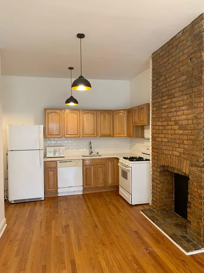 Feast your eyes on this spacious, sunlight-filled condo in the heart of Jersey City Heights. This large 1 bedroom on the 2nd floor of a 4-unit bldg has everything you need: dishwasher, refrigerator, gas stove, tiled bathroom and a HUGE walk in closet. With an open floor plan and 12+ ft ceiling, it makes it seem even bigger! Hardwood floors run throughout YOUR new place and the washer and dryer are just across your entrance door. The building is situated within walking distance from Riverview Park (which has a seasonal Farmers Market) stores, restaurants and supermarkets and NYC views! Plus you have easy access with the lightrail to Hoboken and the Jitney buses or NJ Transit bus 123 directly in front of your doorstep! With pets allowed and a low HOA fee of only $276, this property screams BUY ME NOW!