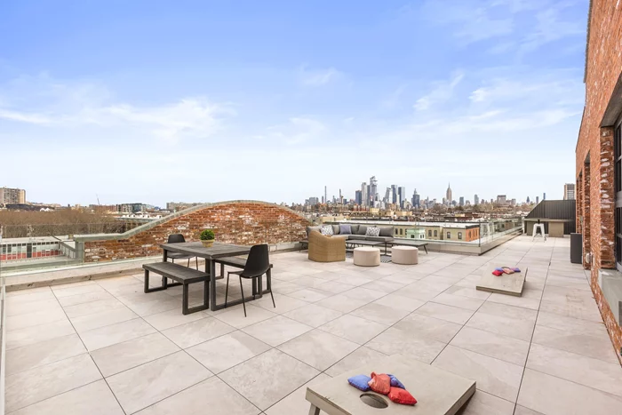 This newly-built, one-of-a-kind penthouse residence is the premier home in the most sought-after and amenity-rich community in Hoboken. Penthouse 701 features a 2, 001 square-foot open-concept design with floor-to-ceiling windows that provide spectacular NYC skyline views and abundance of light and air. Sliding glass doors from the living room, dining room and primary bedroom suite all open to a stunning 1, 895 square-foot wrap-around private attached terrace. With so much living space and three different view exposures, this 3 -bedroom home provides the ideal connection between indoor and outdoor living. The designer kitchen has a center island with seating for four, custom white kitchen cabinetry framed with oak trim and a pull-out pantry, elegant white Calcutta Laza kitchen countertops, top -of-the line kitchen appliances including a built-in Sub-Zero refrigerator/freezer, Wolf gas range, oven and microwave drawer, and Bosch dishwasher, and an under counter wine/beverage refrigerator. The large primary bedroom suite has two view exposures, access to both the main terrace and a private corner terrace, two walk-in closets, and an ensuite spa-like bathroom with a large walk-in shower, a separate soaking tub and a dual sink vanity. The in-residence laundry room is equipped with a Bosch washer and a Bosch dryer. All of the bathrooms include custom wall-hung oak cabinetry with white Glacier honed marble countertops. The hardware floors used throughout the home are beautiful 7.5-inch European white oak plank floors. This home includes two private deeded parking spaces in the onsite garage and a key-less, programmable Latch door entry system. Wonder Lofts is a newly constructed luxury, loft style building, built to LEED Gold standards, within the meticulously restored Wonder Bread Factory in Hoboken, NJ. This full-service, doorman 83-unit condominium offers a world -class suite of shared indoor and outdoor amenities comprising 14 , 400 square feet that create an elevated lifestyle at Wonder Lofts. The highest rooftop, with its stunning 360-degree views of the Manhattan skyline, all of Hoboken and beyond, is a beautifully landscaped patio lounge featuring an infinity-edge swimming pool, lounge chairs, a circular outdoor bar underneath the restored water tower, gas barbecue grills, a fire pit, and abundant dining and lounge seating areas. An indoor residents' lounge on the second floor features a large and elegant living room that opens to a lushly landscaped, outdoor terraced patio and garden with seating areas. A floor-to -ceiling brick, double-faced fireplace separates the living room from an open concept dining room and entertainment kitchen, and an adjacent billiards and game room. Families appreciate the building's children's playroom, complete with padded floors, bean bag seating, toys, and books, as well as a fully equipped children's art room ideal for fostering individual and group creativity and fun. A full gym equipped with the latest cardio and strength training equipment and a separate fully equipped yoga/flex studio keeps residents healthy in body and mind. There is also a screening room with couch seating and video gaming capability. The building also features a two-story24 -hour attended lobby, an additional large residents' lounge with fireplace and co-working/study area, a secure onsite parking garage with electric car charging stations, several common bicycle parking areas, and a pet grooming area that will provide a pleasant space for residents to pamper their furry family members. Wonder Lofts offers building-wide, secure high speed Wi-Fi, a private and programmable smart home entry system, and a building access control system that offers automated package delivery notification. Each residence is complete with a parking spot included and has its own private outdoor living space; either as an attached terrace, patio, or backyard, or a detached private rooftop patio cabana with NYC skyline or sunset views.