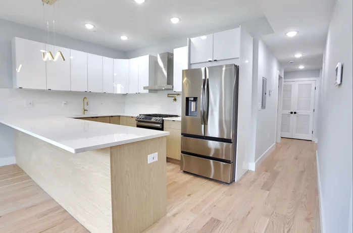 In the Heart of Bergen Lafayette, we are proud to bring to market this Ultra luxury New Construction. This is an exclusive 4 Story Building with 4 different style high end Units. Discover the epitome of modern living when you step into Unit 1 which is conveniently located on the 1st Floor, with its own private entrance, and full access to the private/deeded backyard exclusive for Unit 1. This unit is close to 1200 sq ft, and features open concept living with 3 large bedrooms and 2 full bathrooms, living room, separate dining room. The master suite boasts a walk in closet, private bathroom, with an elegant standing shower showcased in custom tile work. Experience the perfect blend of style and convenience as you step into your luxurious new home. With pristine quartz countertops and a sleek, state-of-the-art kitchen, 2 Full Spa like bathrooms. Just a couple blocks away from the MLK Light Rail train station making this location a commuters dream. Close proximity to public transportation, minutes away from shopping, schools, and parks. Condo will come with a 10 Year Builders Warranty and also 5 year tax abatement. To make your home-buying experience even more rewarding, we're offering an exclusive incentive of 1.5% towards closing costs credits for the buyer. Take advantage of this opportunity to secure your dream home with added financial benefits. Call today for your private tour!
