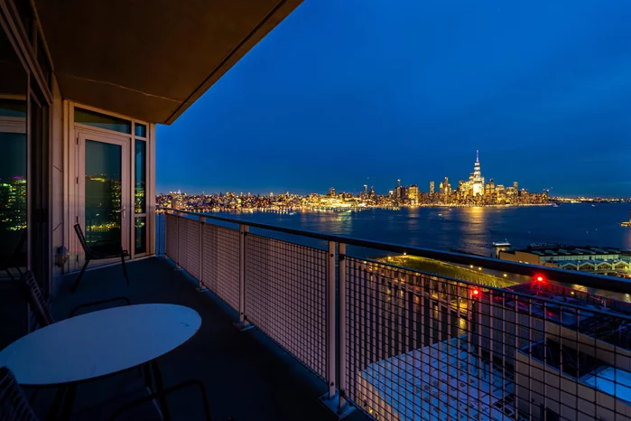 Welcome to the epitome of luxury living at the W Residences! This prestigious address offers unparalleled views of the Hudson River and the iconic New York City skyline, providing residents with breathtaking vistas of both spectacular sunrises and gorgeous sunsets. Step into this expansive 1961 square foot, 2 bedroom, 2.5 bath home, where every detail has been meticulously crafted to exude sophistication and comfort. The gourmet kitchen boasts state-of-the-art appliances, including a Viking professional series gas range, Miele dishwasher, Sub-Zero fridge/freezer, and Viking wine fridge. Floor-to-ceiling windows flood the space with natural light, complemented by elegant bamboo floors throughout. Indulge in the tranquility of exquisite bathrooms adorned with luminous glass tile and granite countertops, featuring dual vanity sinks, walk-in showers, and large spa tubs. Additional features include a washer/dryer, multiple fabulous balconies, and ample storage space, enhancing the convenience and comfort of this exceptional residence. Residents of the W Residences enjoy access to an array of amenities, including a fitness center, concierge services, valet parking, extra storage, and an on-site restaurant and lounge. With close proximity to all transportation options  including PATH, ferry, and buses  as well as Hoboken's vibrant shops and restaurants, every convenience is at your fingertips. Experience the pinnacle of luxury living at the W Residences, where unparalleled views, exquisite amenities, and a prime location combine to create the ultimate lifestyle experience. Welcome home! Open House 6/13 5-7PM 6/15 12-2PM