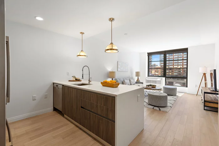 Beautiful South facing two bedroom and two bathroom condo in the heart of Downtown Jersey City. Magnificently designed by famed architect, Fogharty Finger, this condo features 5 brushed white oak flooring, Italian Pedini cabinetry, stainless steel appliances & fixtures including Bosch, Meile, Bertazzoni, Kohler & Hansgrohe. The Oakman is an elevator building offering 24-hour concierge services, cold storage facilities, bike storage, fitness center, children's playroom, residents' lounge, rooftop pool, BBQ grills and outdoor fireplace. Located near restaurants, shops and three blocks to the Grove Street PATH. Nearby parking available for rent. Building has a tax abatement until 2036.