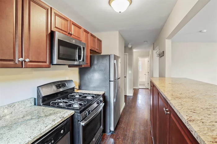 Come check out this well maintained 2 bed 1 bath in JSQ close to St Peters! This apartment has tons of natural light with a cozy feel! It features a galley kitchen with an open concept layout, Stainless steel appliances, granite countertops & 2 great sized bedrooms! 0.5 miles from JSQ PATH station and 0.2 miles to the the bus stop on JFK (119 Bus) that takes you to Port Authority!