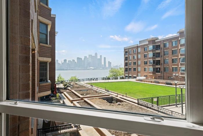 Welcome home to this Southeast facing, inner courtyard, 2 bed 2 bath condo located at the prestigious Grandview II. This waterfront community is located directly across from midtown NYC! This home stretches across 1, 385sqft & features a chef inspired kitchen w/SS appliances, undermount lightening, granite countertops, & a center island opening to the dining/living room making it perfect for entertaining! The living room has oversized windows allowing sunlight to flow in and a large balcony to enjoy the views of NYC and the Hudson River. The spacious primary en-suite comes w/dual vanities, a separate shower & jacuzzi tub, & a large walk-in closet. Generous size 2nd bed & full bathroom located on the other side of the home for extra privacy. Community offers 24hr doorman, pool, business center, fitness center, & easy trip into NYC w/just a short walk to Ferry, Light Rail & NYC bus stop at the community entrance. This complex has restaurants, shops & grocery store right down stairs!