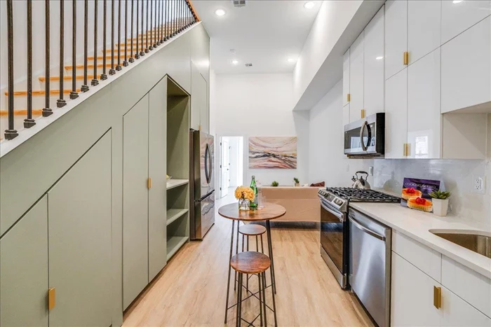Open House Fri 5/31 5:30-7pm, Sat 6/01 and Sun 6/02 1-3pm! Recently constructed condo with a boutique-style ambiance and private rooftop! Situated in the coveted Jersey City Heights neighborhood, 234 Webster offers top-notch appliances and finishes including washer/dryer in unit and stainless steel appliances. With impressive 14-foot ceilings and black custom architect windows, the home is flooded with natural light. Thoughtful design is evident, with custom-built Chanel-inspired closets, elegant quartz one-piece backsplash with countertops in the kitchens, and real oak wood European-style stairs. The bathrooms feature innovative three-way plumbing fixtures, and upgraded hardware. Cove lighting adds a touch of sophistication, complemented by upgraded tile finishes, floor-to-ceiling tiling, and a clean coat of high-end frameless shower glass doors. Experience tranquility with exceptional soundproofing, minimizing noise transmission between floors. The prime location is nestled between Palisade Ave and Central Avenue. Enjoy your neighbors of Corto, Riverview Wine and Spirits, The Franklin, Bread & Salt (Top Pizzeria in Jersey City), Low Fi Bar, and Dulce De Leche Bakery. Close to great attractions such as Jersey City Mural, Hudson River Waterfront Walkway, Trader Joes (10 minutes), and shopping along Central Avenue. The Jersey City Heights neighborhood is very close to the Holland Tunnel, Home Depot, and Newport Center Mall, providing easy access to major bus lines and the Congress St light rail and 2nd St light rail, offering a convenient and direct route to NYC.