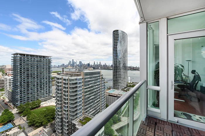 Welcome home to this beautiful 800 sq ft 1bed/1bath plus balcony on the 25th floor with amazing unobstructed NYC views. Chef's kitchen includes ss appliances & tons of cabinet space. Kitchen flows into the open living space providing plenty of room for entertaining. Floor to ceiling windows allow for an abundance of natural light & great views throughout the home all day long. Home features hardwood floors, central AC, & washer/dryer in unit. Building's luxury amenities include: 24hr concierge, fitness center, jacuzzi, sauna, resident lounge, conference room, kids room, and roof deck with amazing NYC views. Prime location between the Hoboken & Newport PATH Station and close to Ferry, and light rail.