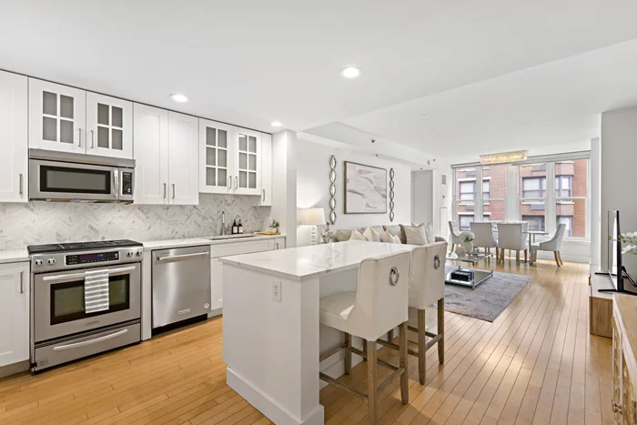 Open House June 8th & 9th 12-2PM! Welcome to 1125 Maxwell Lane, Hoboken! This stunning 2-bed, 2.5-bath condo offers luxurious living with NYC views. Nestled in the prestigious Maxwell Place complex, this home features 1, 643 sq. ft. of open living space, perfect for entertaining. The chef's kitchen boasts a large island, stainless steel appliances, ample cabinet space, and a spacious pantry. The expansive living and dining areas are ideal for gatherings. The master suite includes an en-suite bath and custom his-and-her walk-in closets. Additional highlights include a dedicated dining area, abundant storage, in-unit laundry, and a balcony. Maxwell Place provides an array of five-star amenities: 24-hour concierge service, a state-of-the-art fitness center, a swimming pool with river and city views, a residents' lounge, billiards, a screening room, and a shuttle to the PATH station for easy commuting. This prime location at 11th & Hudson offers convenience with nearby shopping, parks, top-rated schools, and easy access to public transport.