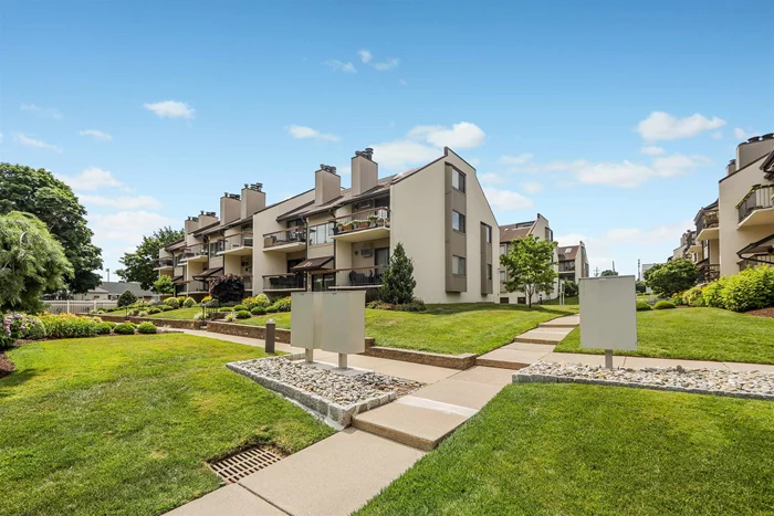 For sale end unit duplex condominium surrounded by windows. Located at The West Ridge Mews in Wood Ridge NJ. This spacious two level condo features a main entrance that opens to a living room which contains sliding glass doors that lead to a spacious covered balcony facing a beautiful courtyard. Also a wood burning fireplace. Combined with a dining room area next to a kitchen with stainless steel appliances. A Full size bathroom includes space for a stackable washer and dryer. Has a large master bedroom. A spiral staircase leads down to a finished basement with it's own separate entrance. This large room can be used as a home office, playroom or TV room. A second door leads to a one car attached garage with an separate storage room. A over head mini shelf provides additional storage. The condo offers access to restaurants, schools and many local shops. Public transportation makes commuting to Manhattan easy either by train, bus or car. This condo provides the perfect blend of style, space and travel convenience. The condo is in move in condition. No dogs allowed. Cats allowed.