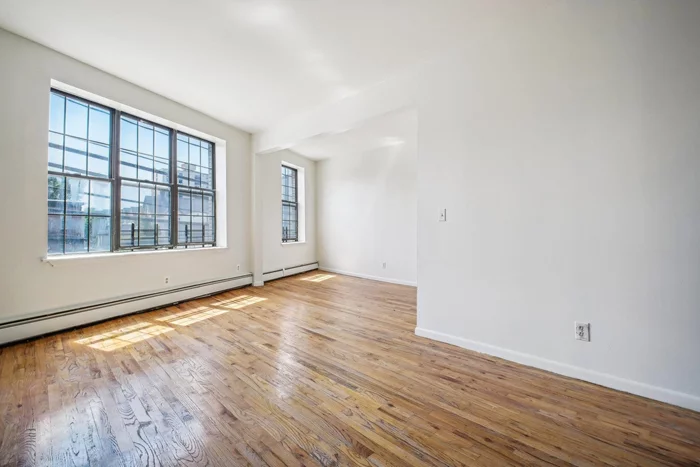 Newly refurbished 2 bedroom, one bath apartment, 998 sq. ft. Nice layout with gleaming hardwood floors throughout, tiled bathroom, plenty of closets and laundry on premises! Convenient to shopping and buses to NYC & Journal Sq PATH and all major highways. Can be purchased as a package with three other units providing a prime investment for a savvy investor! Reach out for full details.